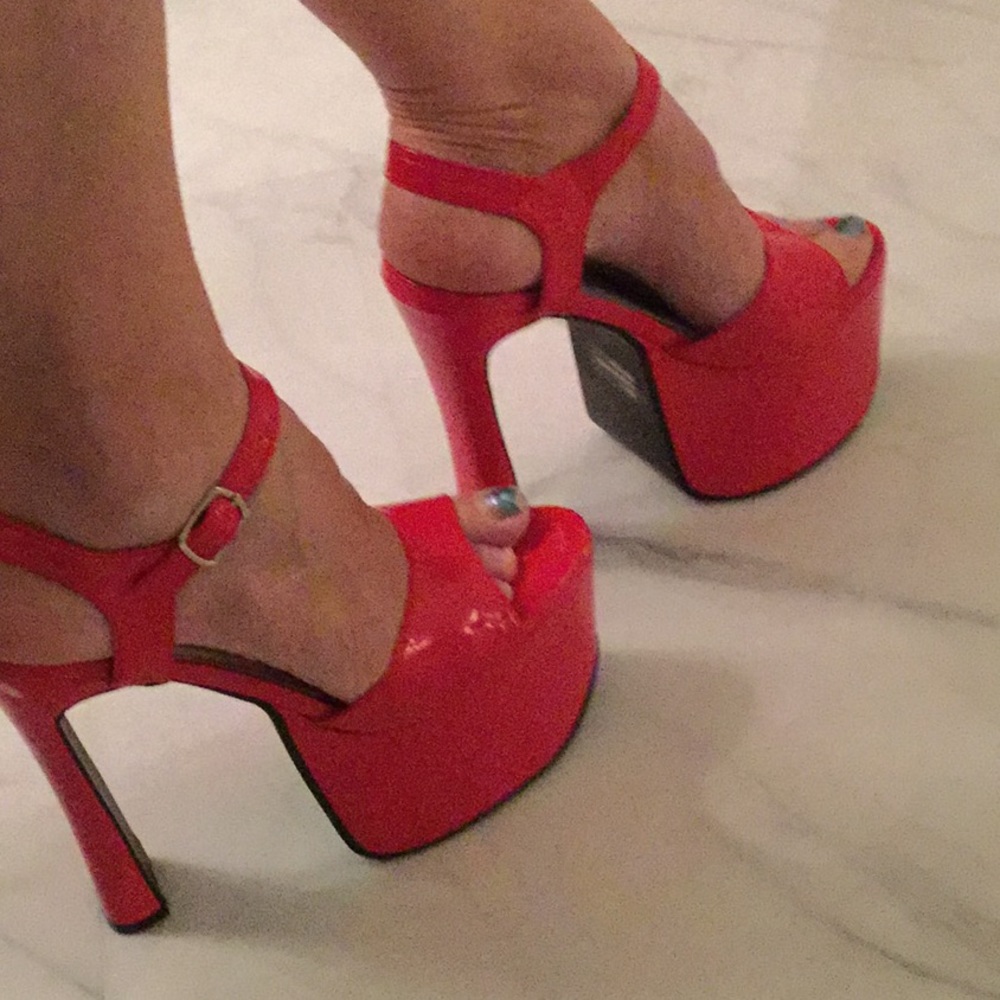 Red pole dancing shoes (looks like stripper heels)